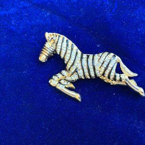 Vintage zebra pin with Swarovski crystals.